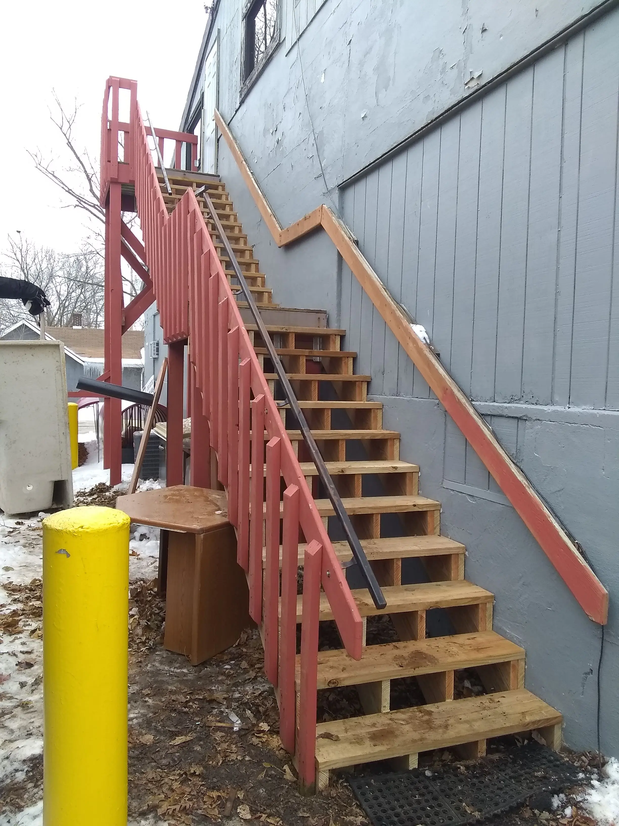 Red Exterior Staircase Commercial Repair